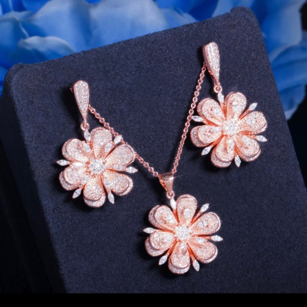 Rose gold earrings and necklace.